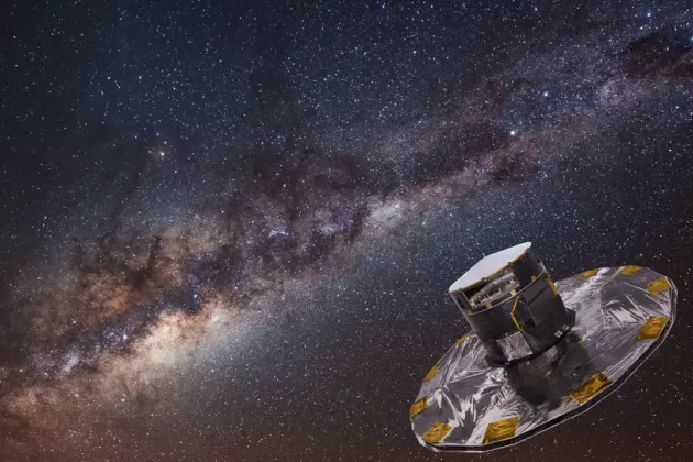 The Gaia space telescope, launched in 2013, is mapping the Milky Way through astrometry. Photo: ESA/ATG medialab; background: ESO/S. Brunier. 