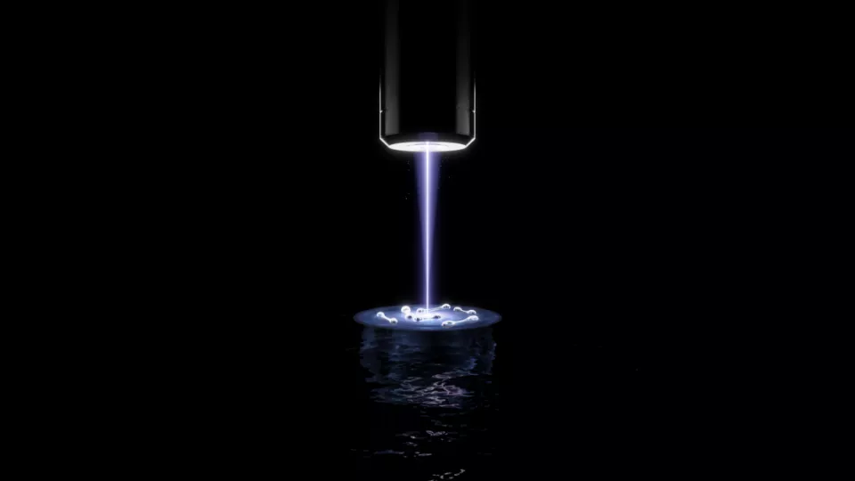 The upper part represents the experiment with a laser that shines on the 2D trap with atoms. In the lower part you can see how the atoms act when they pair, while the water represents their properties as superfluids. Illustration: Jonas Ahlstedt.